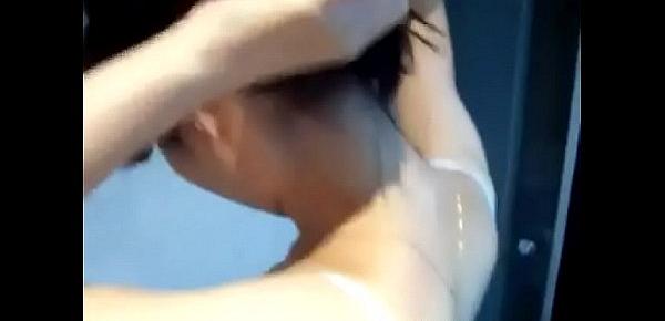  Amateur Asian girl is taking shower and touching herself in bed